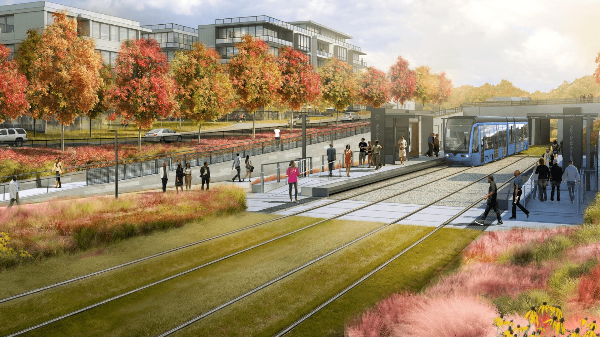 Rendering of a BeltLine transit station at Ralph David Abernathy Boulevard with a streetcar, platforms, riders, trail, and landscaping.